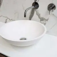 a basin sink in a bathroom