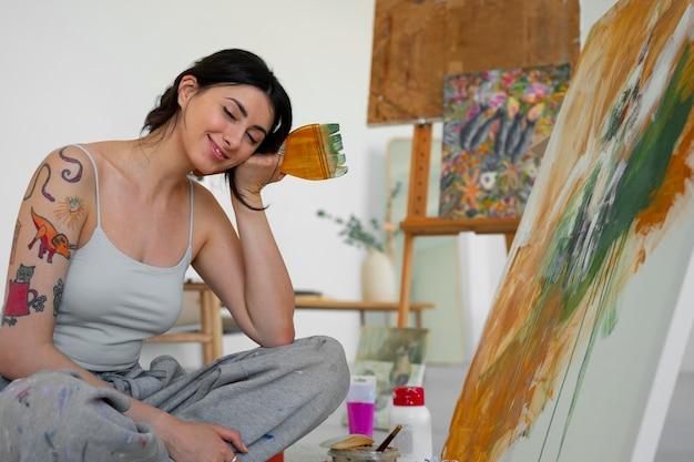 Braless woman working indoor